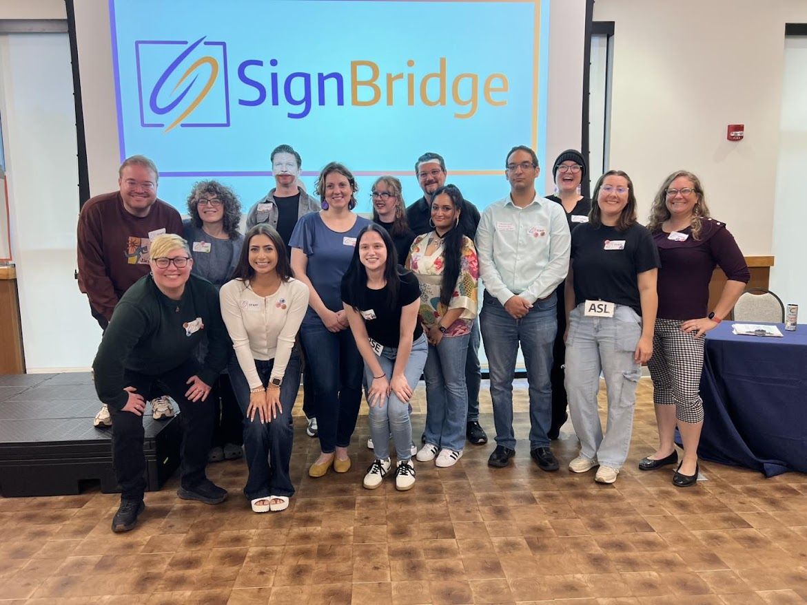 SignBridge community members signing together